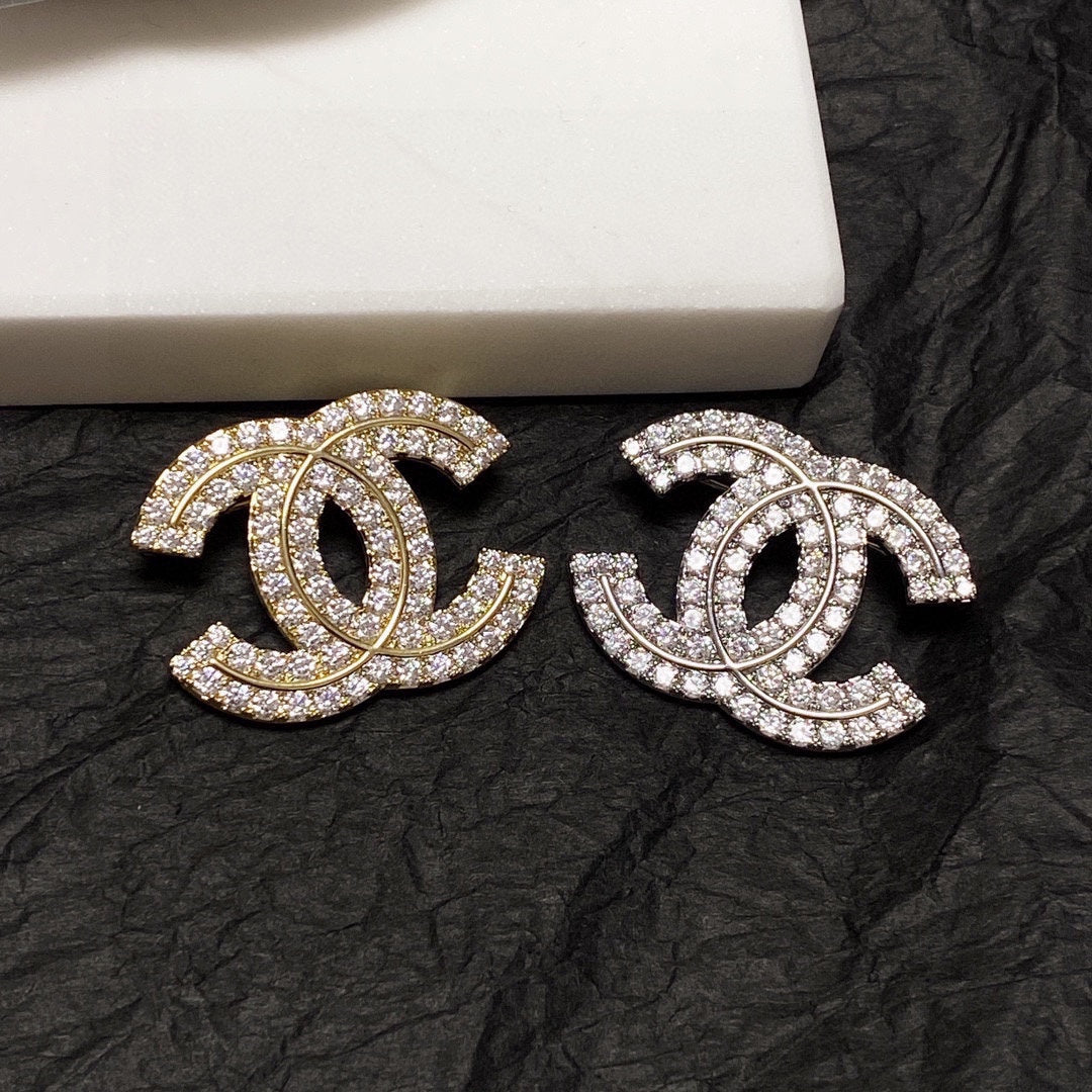 18K Chanel Diamonds Set Broochs